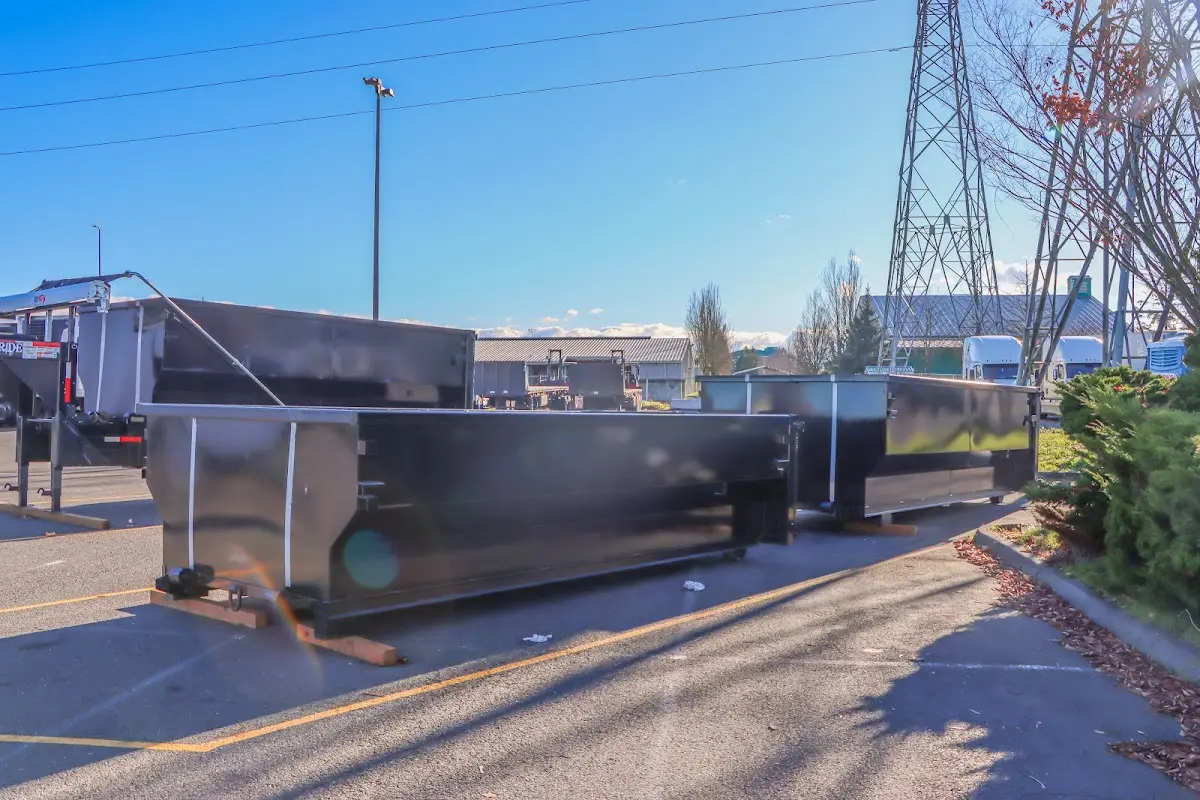 Roll-off dumpster ready for waste disposal at job site for Demolition Dumpster Rental in Royalton